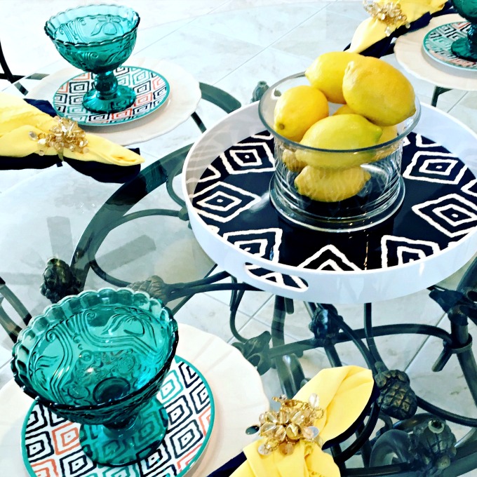I love decorating with lemons to bring out the pops of yellow. www.jennelyinteriors.com