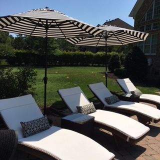 We are redoing our back yard and I love using black and white as the main color scheme. These chaise lounges from Frontgate are my favorite new purchase. www.jennelyinteriors.com