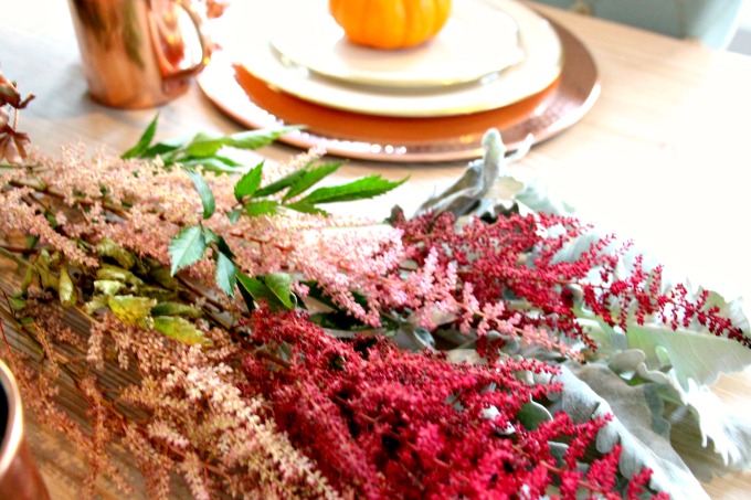 The fall colored foliage gives the table a fresh look. www.jennelyinteriors.com