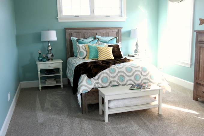Blue guest room with a coastal design. www.jennelyinteriors.com