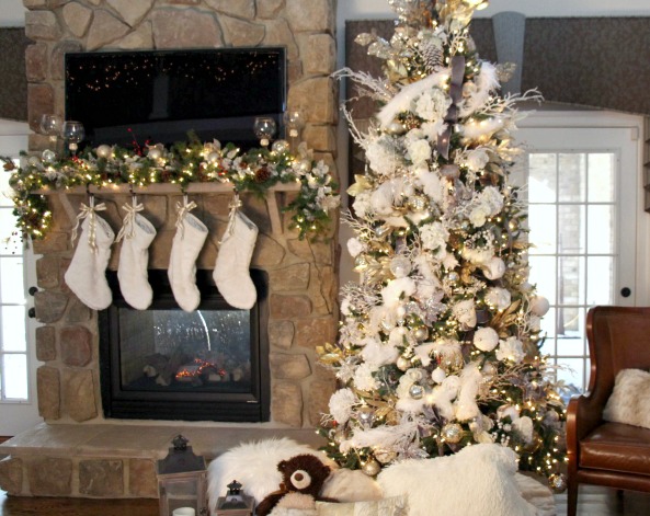 A cozy scene complete with fire. www.jennelyinteriors.com