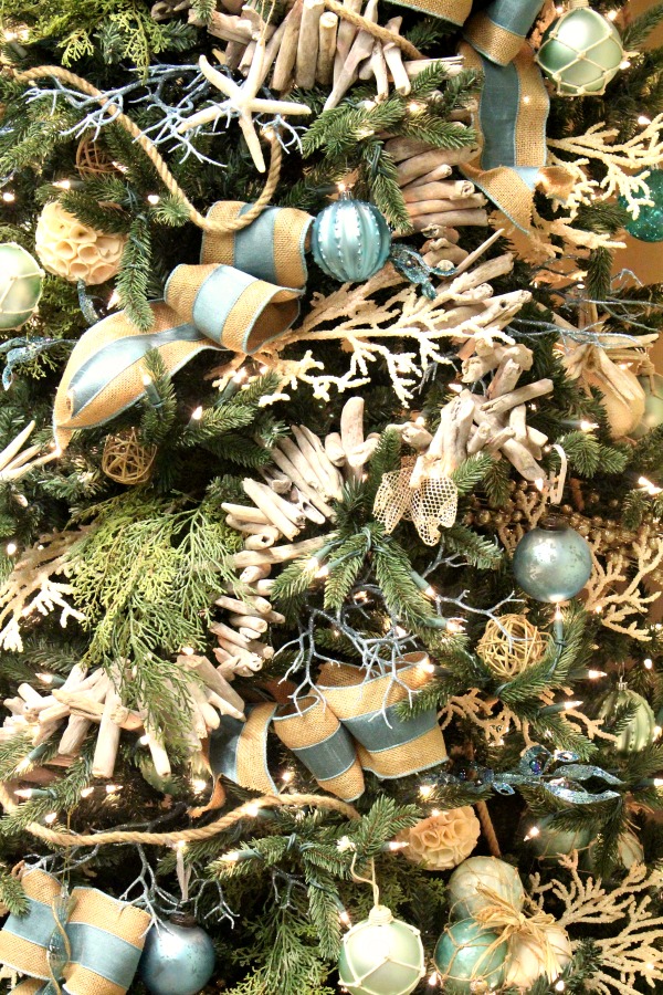 Coastal Christmas tree done in gorgeous blue, green and natural elements. jennelyinteriors.com Coastal Christmas tree done in gorgeous blue, green and natural elements. jennelyinteriors.com